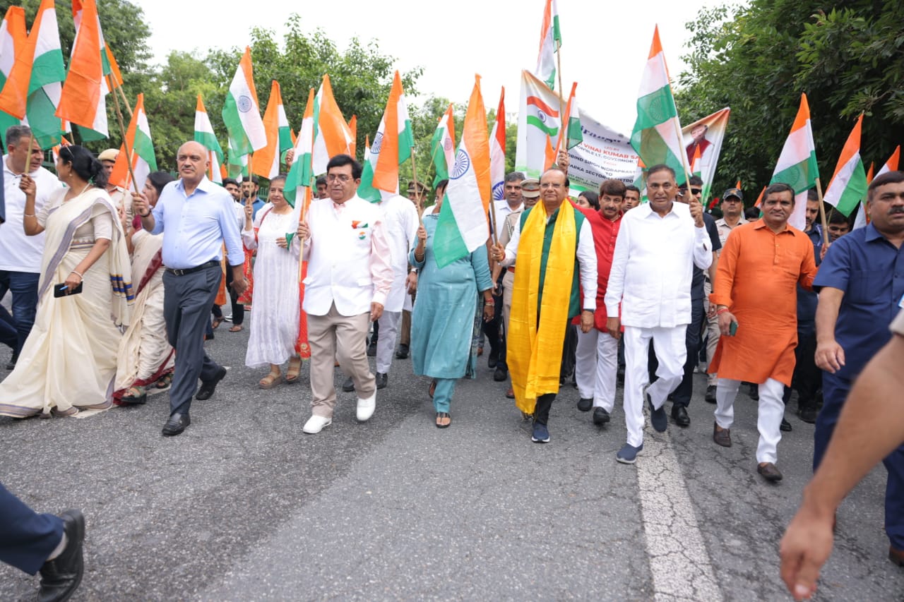 Lieutenant Governor Vinai Kumar Saxena leads the 'Har Ghar Tiranga' campaign during the Tiranga Yatra at IP University, joined by thousands of students, staff, and community members to celebrate national pride and unity.